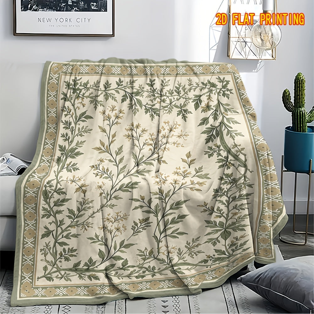 Plaid flanelle bohème motif sauge sur canapé