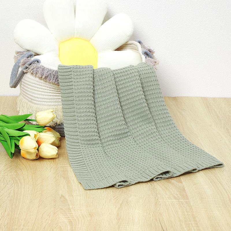Plaid tricot compact vert clair, mise en situation