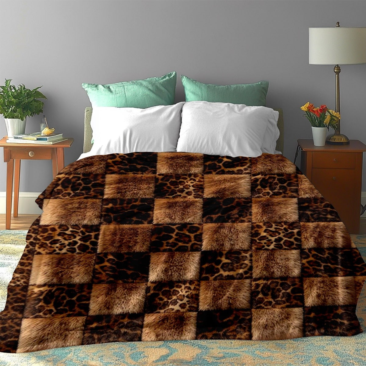 Plaid léopard patchwork fausse fourrure sur un lit