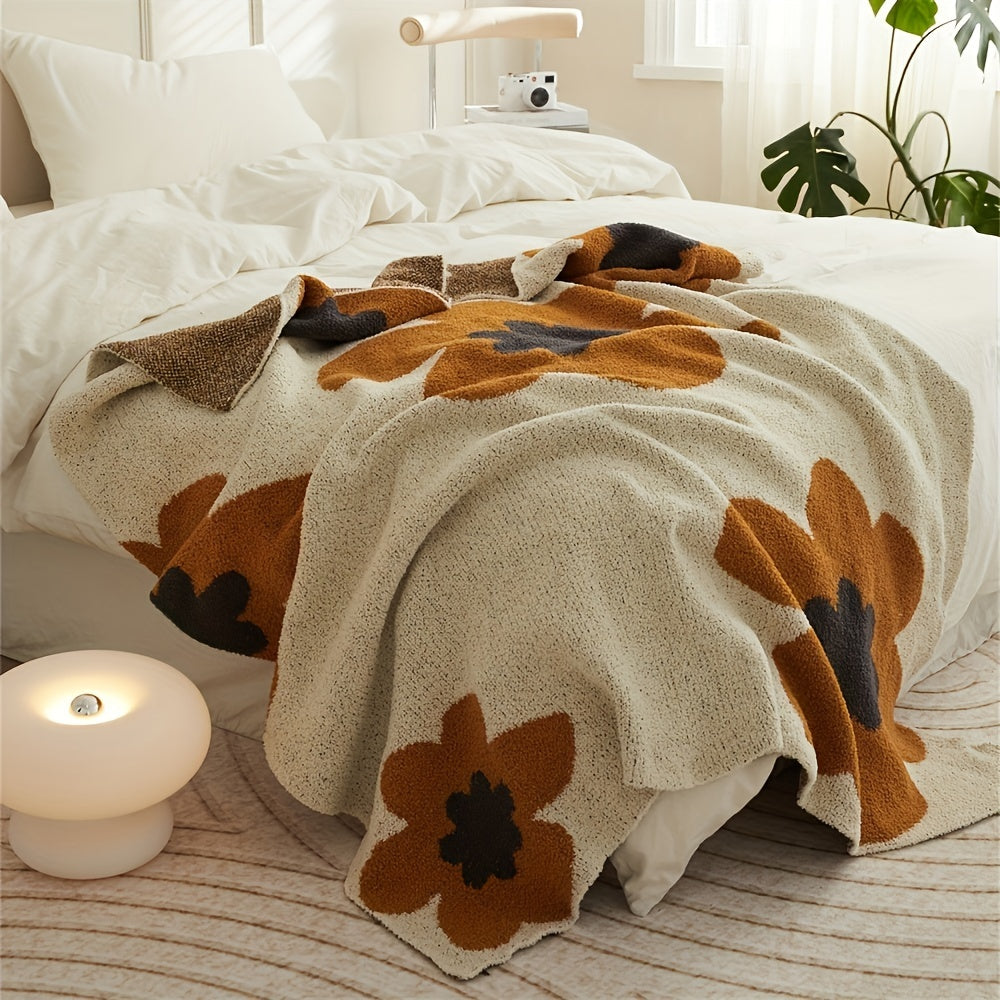 Plaid bohème motif fleur tournesol sur un lit
