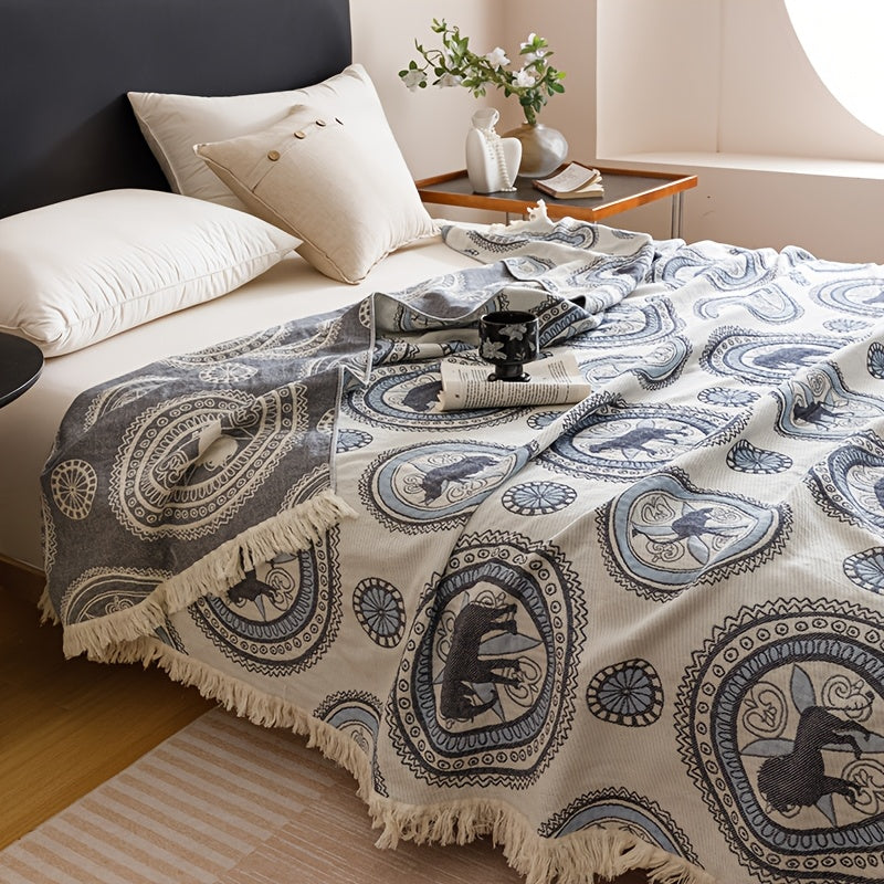 Plaid en coton jacquard à franges – motif médaillons bleus