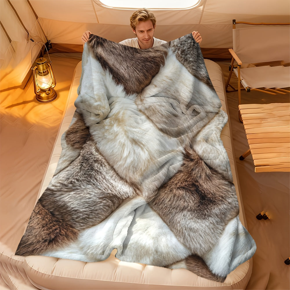 Plaid fausse fourrure patchwork marron et blanc en camping Image