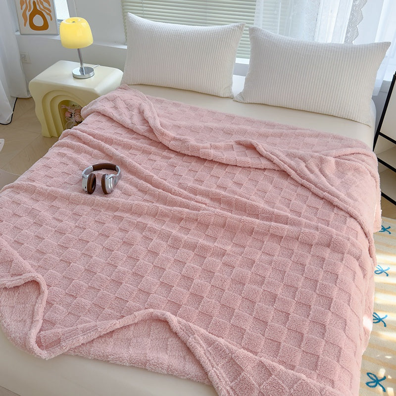 Plaid en peluche à motif damier