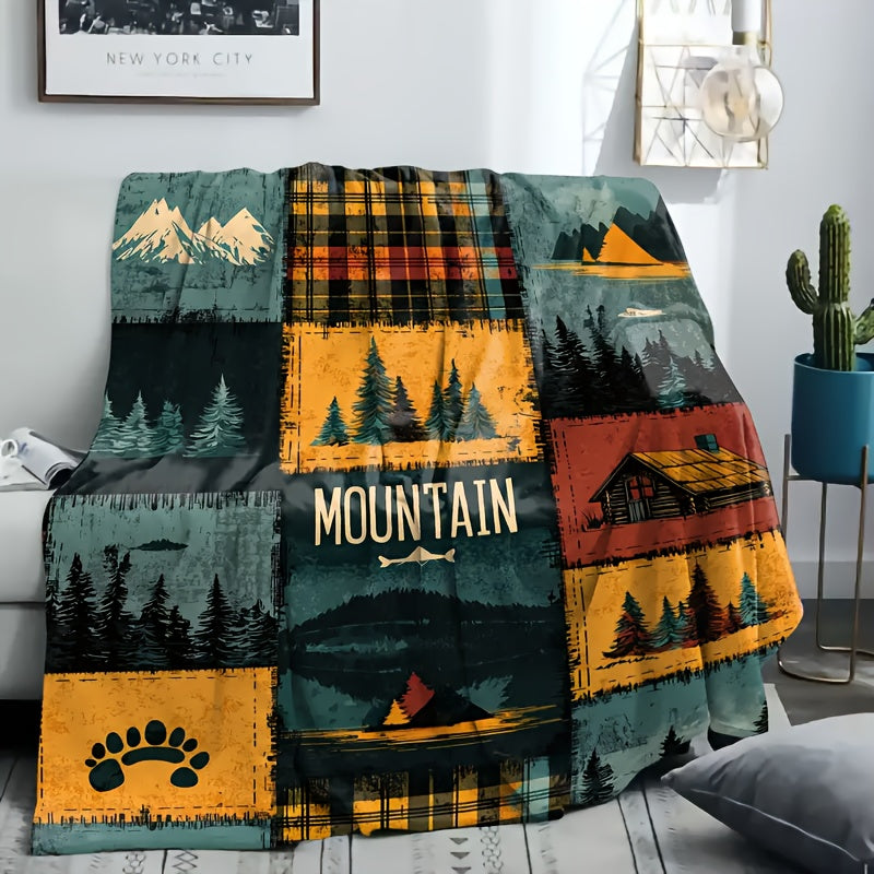 Plaid patchwork montagne rustique sur canapé Image