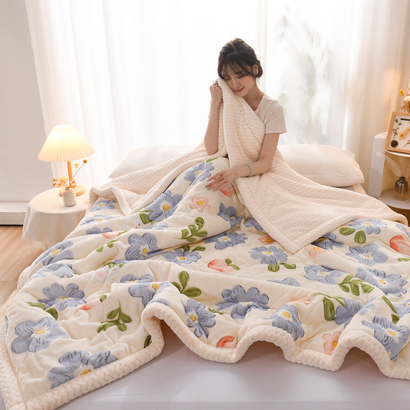 Plaid polaire matelassé motif floral, détail du tissu