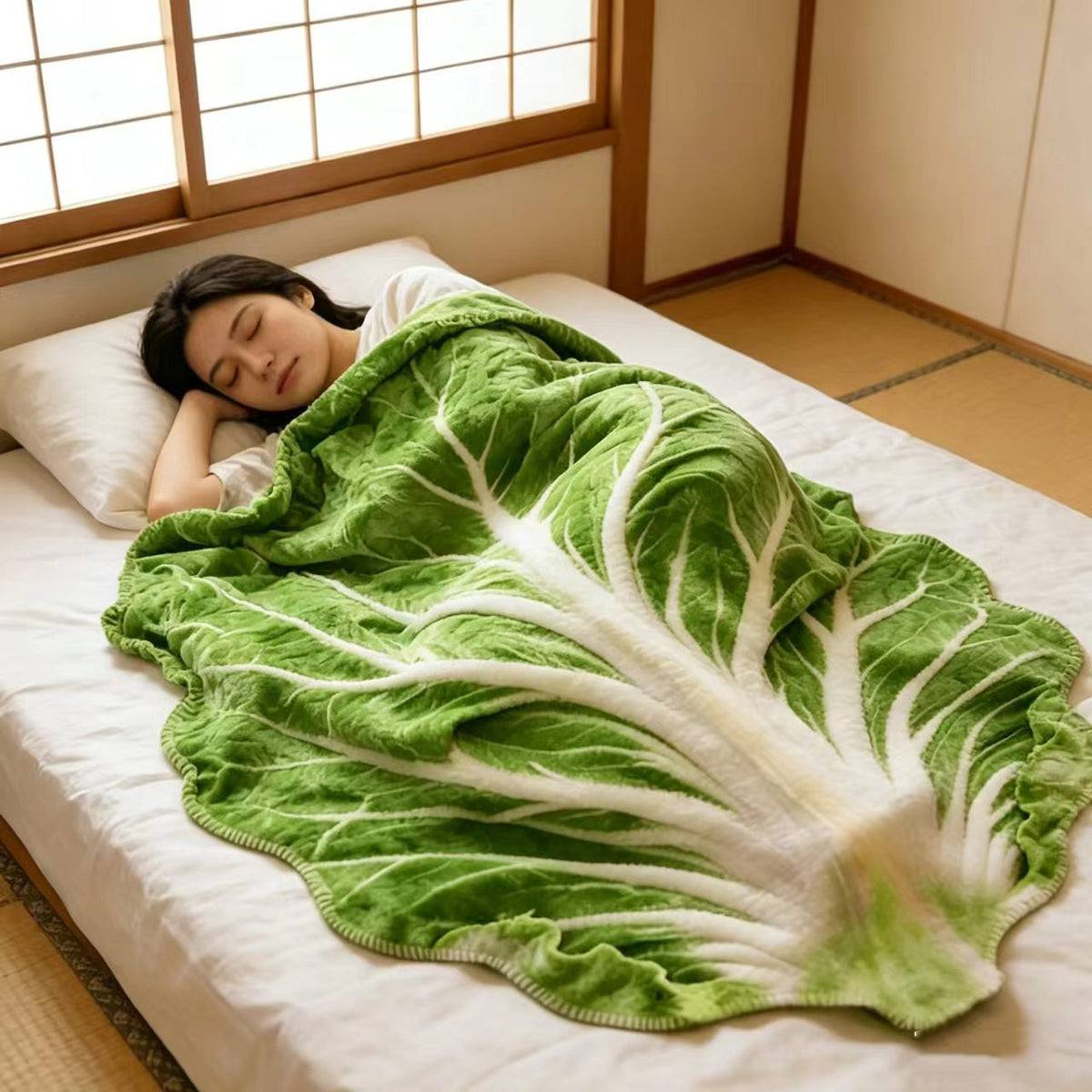 Plaid polaire forme de chou sur un lit