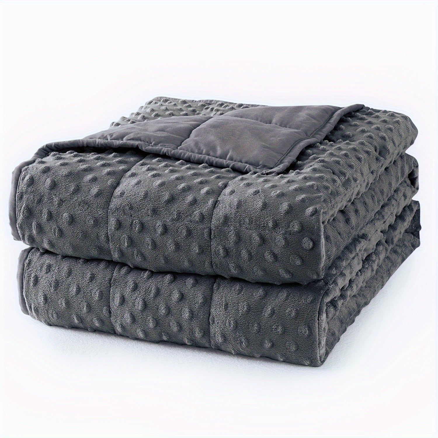 Couverture lestée grise texture gaufrée – pliée, face réversible Image