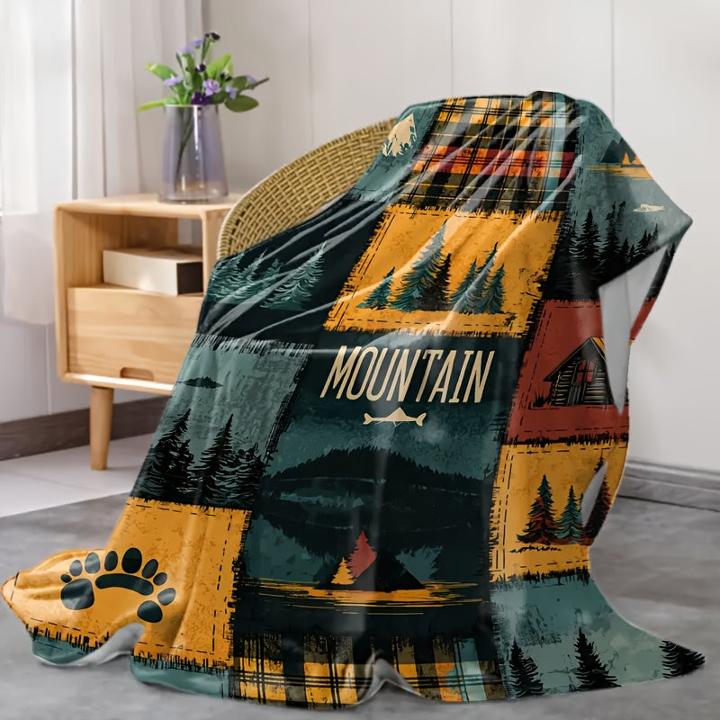 Plaid patchwork montagne rustique sur fauteuil