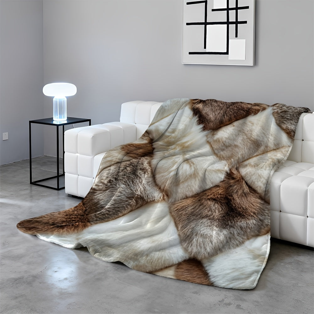 Plaid fausse fourrure patchwork marron et blanc sur canapé