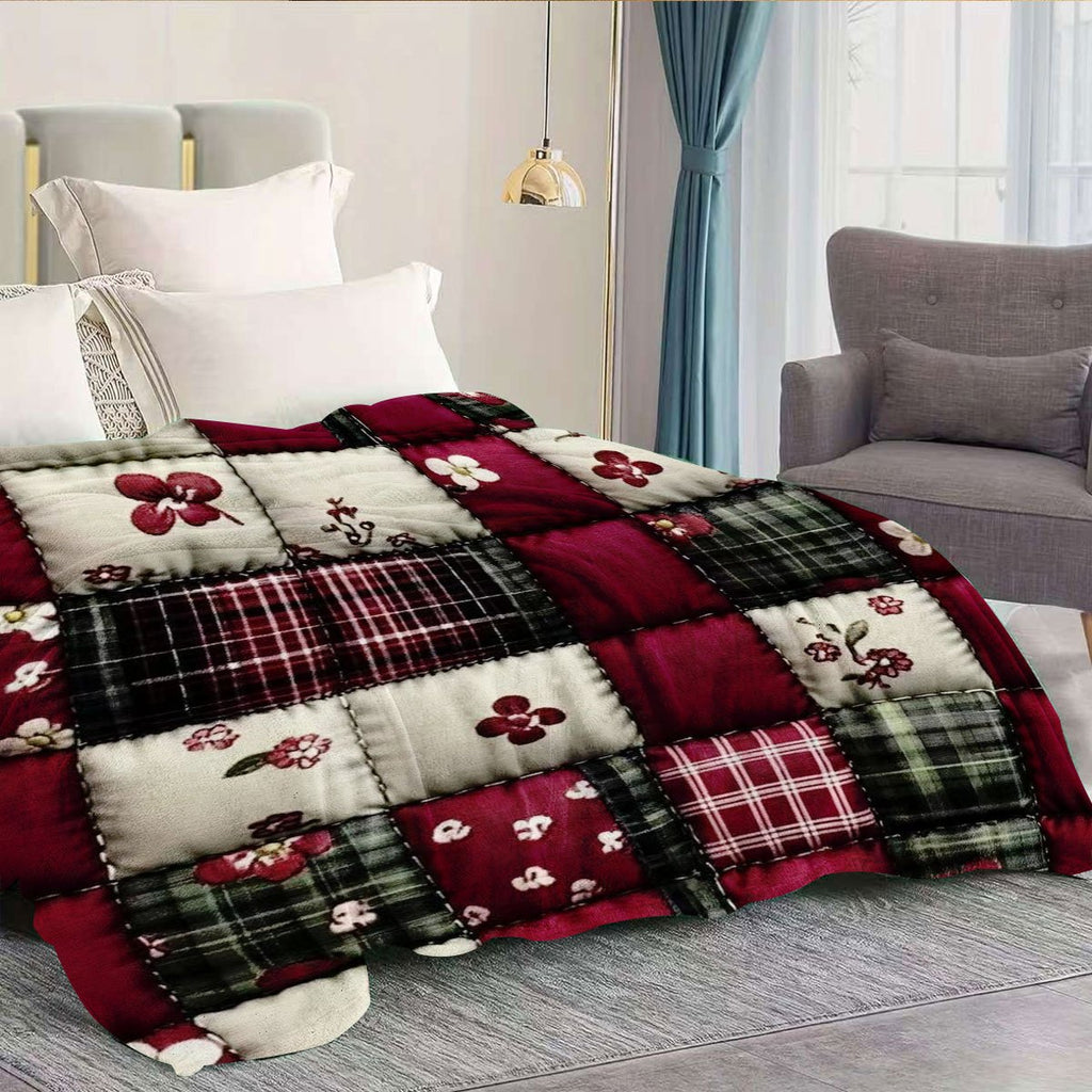 Plaid patchwork bourgogne à motifs floraux – sur lit